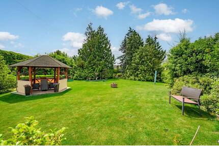 Kerpen-Sindorf: Familienparadies auf 2.500 m² Parkgrundstück + Wintergarten + 3 Garagen im Zentrum