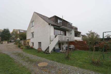 55m² Wohnung auf 3 Zimmer im Reihenhausstil mit zusätzl. ca. 25m² Nfl. im Souterrain und Gartenteil - Grömitz