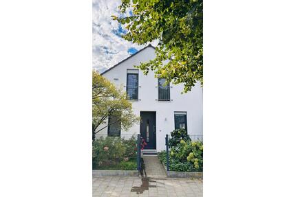 Doppelhaushälfte in Münster‑Wolbeck mit Garten und Garage