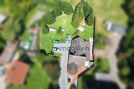 Charmantes Einfamilienhaus mit Wintergarten, Kaminofen und großzügigem Grundstück - Nordleda