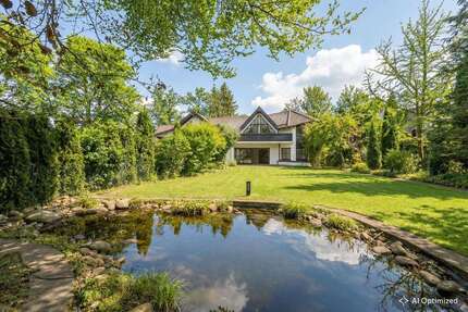 Haus zum Mieten in Grünwald 7.900,00 € 328 m²