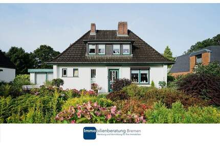 Charmantes Einfamilienhaus auf attraktiven Hanggrundstück mit Carport - Ritterhude