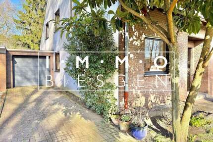 Der Sommer kann kommen. Familienhaus mit Garten, Garage und Kellerbar in Rhein-Nähe - Duisburg Hochemmerich