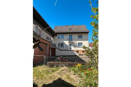 Einfamilienhaus in ruhiger Wohnlage mit 2 Garagen ca. 215 qm - Rammelsbach