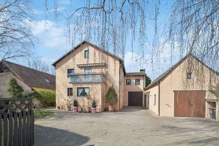 Haus zum Kaufen in Hallbergmoos 987.000,00 € 206.95 m²