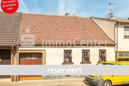 Zwei Häuser - mehrere Möglichkeiten: Vielseitiges Wohnkonzept in Philippsburg