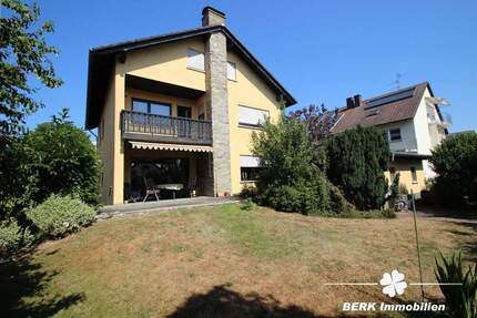 BERK Immobilien - Charmantes Einfamilienhaus mit Doppelgarage und großem Grundstück in Mainaschaff