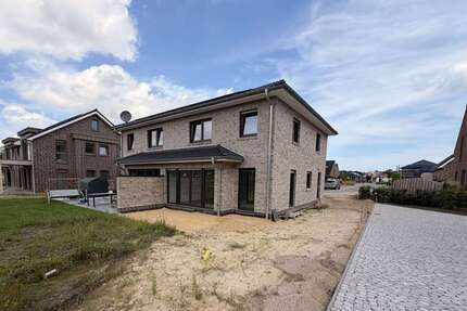 Haus zum Kaufen in Wiefelstede 440.000,00 € 121 m²