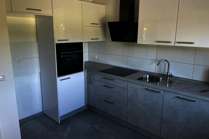 Helle Maisonettewohnung mit dir. Gartenzugang und Wintergarten - Waldems
