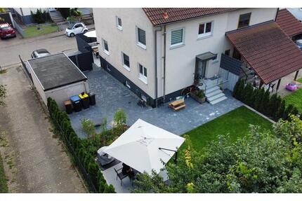 Moderne Doppelhaushälfte mit zwei Terrassen und gepflegtem Garten - Senden