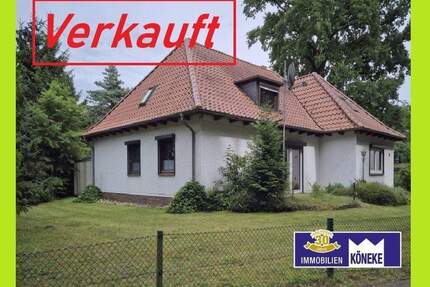 Walmdach Winkelbungalow mit Teilkeller, Doppelgarage, in begehrter Lage in Fahrenhorst - Stuhr