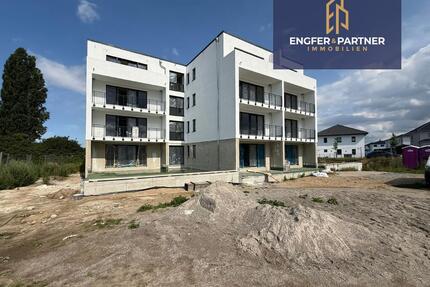 Hochwertige Neubau-Mietwohnung mit 2 Zimmern, Tiefgaragenstellplatz, Fahrstuhl und Balkon! - Bad Doberan
