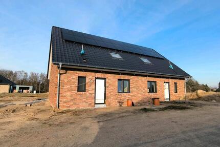 Neubau-Doppelhaushälften in Sarzbüttel zu vermieten - Heide