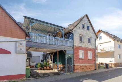 Haus zum Kaufen in Lollar 349.000,00 € 308 m²