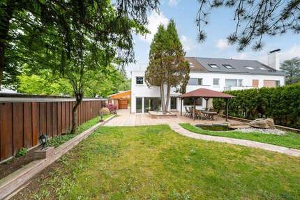 AIGNER - Reiheneckhaus mit viel Platz und großem Garten in Taufkirchen