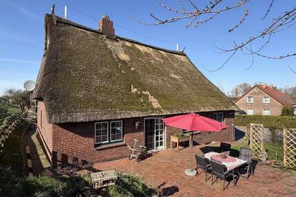 Wohnen direkt am Deich - Großzügiges Reetdachhaus für die gesamte Familie - Seestermühe