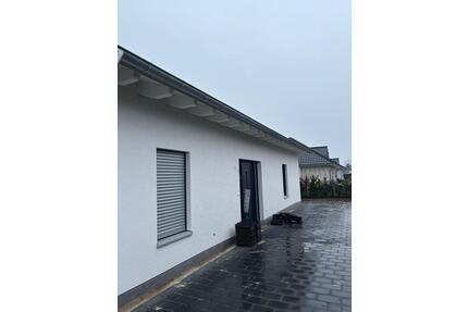 Neubau Haus Bungalow - 1.150,00&nbsp;EUR Kaltmiete, ca.&nbsp; 103,00&nbsp;m&sup2; in Herzlake (PLZ: 49770)