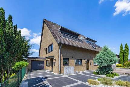 Haus zum Kaufen in Langenfeld 895.000,00 € 257 m²