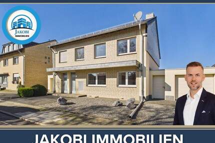 Freistehendes Einfamilienhaus mit zwei Garagen und viel Potential in Bedburg-Rath