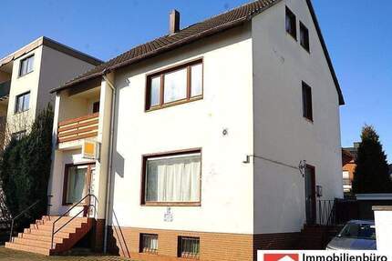 Zweifamilienhaus mit zwei rechtlich getrennten Einheiten bzw. Ladenlokal mit einer Wohnung in Bennigsen - Springe