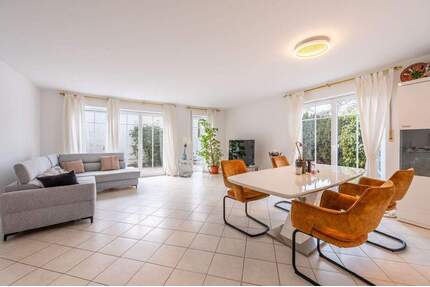 AIGNER: Garten-Oase mit Charme: Helle Erdgeschosswohnung mit flexiblem Grundriss - München Trudering-Riem