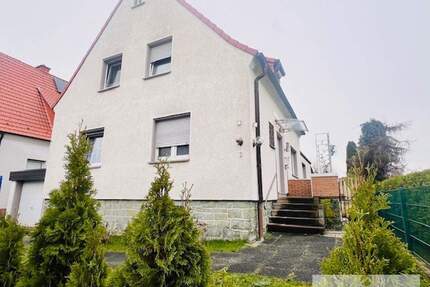 Ein-Zweifamilienhaus mit Gartenidylle und Ausbaupotential in Werl-Büderich zu verkaufen!