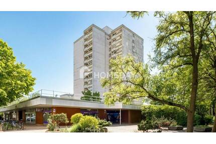 Weitblick über München: lichtdurchflutete 1,5-Zimmer-Wohnung mit Loggia und Tiefgaragenstellplatz