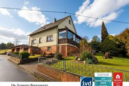 Einfamilienhaus mit Einliegerwohnung in Bretthausen -VG Rennerod! Familienfreundlich! 4 Garagen!