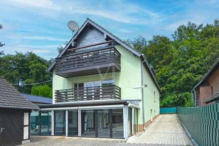 Haus zum Kaufen in Langenfeld 640.000,00 € 233 m²