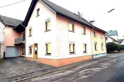 Charmantes Einfamilienhaus mit Garage, Scheune und zusätzlichem Gartengrundstück in Großlittgen