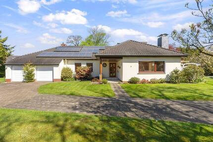 Attraktiver Bungalow auf tollem Grundstück mit ausgebautem Dachgeschoss, Wintergarten und Doppelgarage - Osterholz-Scharmbeck Innenstadt