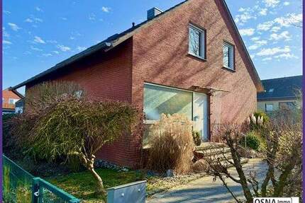 Ein- oder Zweifamilienhaus großem Garten und Garage in Bissendorf