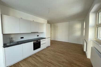 3-Zimmer Corner-Suite mit Balkon im Hochparterre I Erstbezug I Posthof Gransee® 1.01 - Löwenberger Land