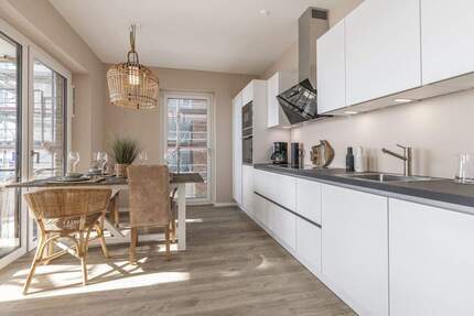 Erstbezug: Erstklassige 4-Zimmer-Neubauwohnung mit großer Dachterrasse - Lübeck-Travemünde