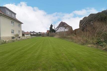 Baugrundstück mit genehmigtem Einfamilienhaus - sofort realisierbar - Lage