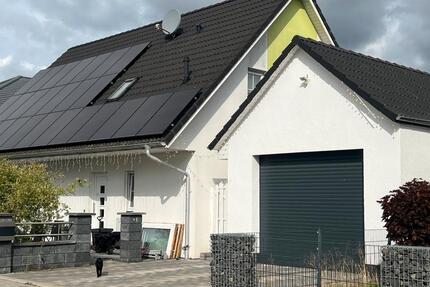 Haus Einfamilienhaus mit Garage und Garten - Wabern