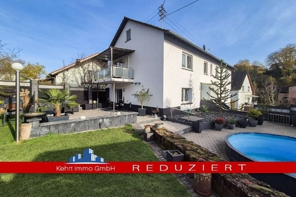 Großzügiges Wohnen für zwei Generationen: Poolbereich mit Poolbar und barrierefreiem EG - Katzweiler