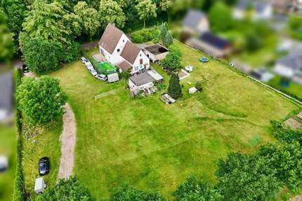 Haus zum Kaufen in Schlangen Oesterholz-Haustenbeck 995.000,00 € 126 m² - Schlangen / Oesterholz-Haustenbeck