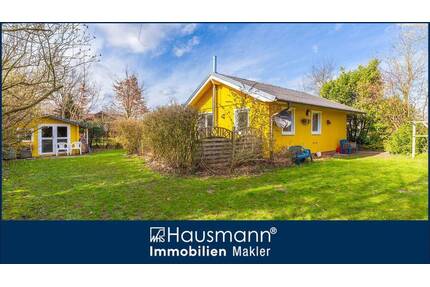 Charmantes Ferienhaus mit Kamin und großem Garten unmittelbar am Nehmser See!