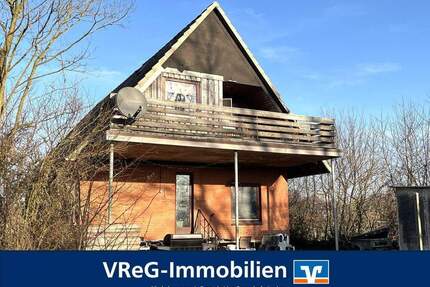 Feldrandlage: Vermietetes Einfamilienhaus mit Sanierungsbedarf in Rade b. Hohenwestedt