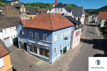 Haus zum Kaufen in Münster-Sarmsheim 299.000,00 € 230 m²