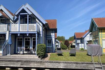 Ferienhaus mit eigenem Bootssteg im Hafendorf Rheinsberg