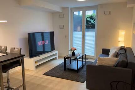 Möblierte Neubauwohnung mit Tiefgaragenstellplatz + Terrasse - Kiel