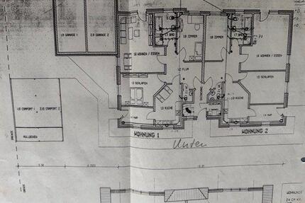 Eigentumswohnung Erdgeschoß mit Garage u. Garten in einer DHH - Kropp