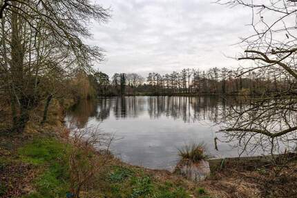 *** seltener SEEBLICK in einer der TOP LAGEN von GANDERKESEE HEIDE mit GARAGE und WINTERGARTEN ***