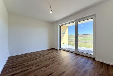 Neubau-Erstbezug: Helle 2-Zimmer-Wohnung mit Süd-Terrasse und eigenem Garten! - Roßbach