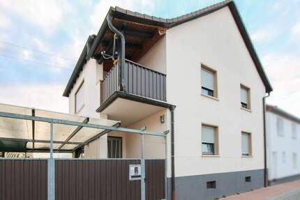 Einfamilienhaus mit 2 Garagen und großem überdachten Innenhof - Böhl-Iggelheim