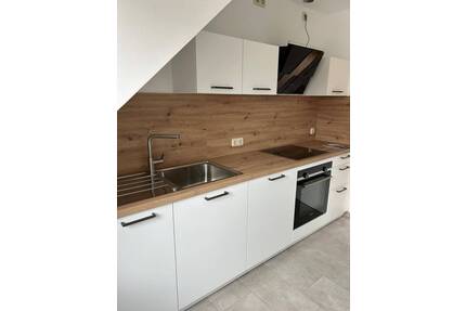 Moderne 2,5-Zimmer-Wohnung mit Dachloggia in Erlangen