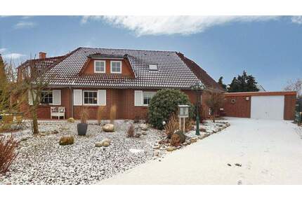 Solide Doppelhaushälfte mit viel Platz, Kaminbereich und großzügigem Garten - Landesbergen