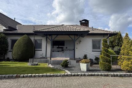 IMMOBILIEN GUMNIOR präsentiert: gepflegter, ebenerdiger Bungalow mit schönem Garten und Garage - Neuenkirchen